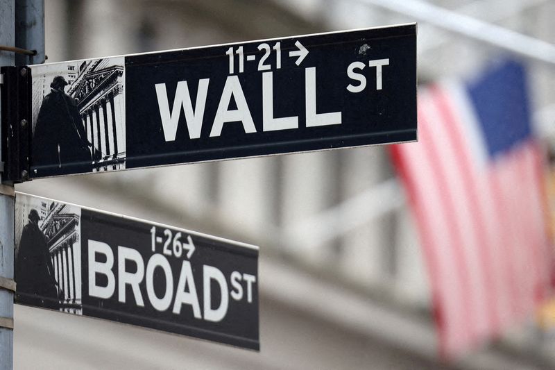 Analysis-Wall Street job cuts loom as market turmoil stalls deals